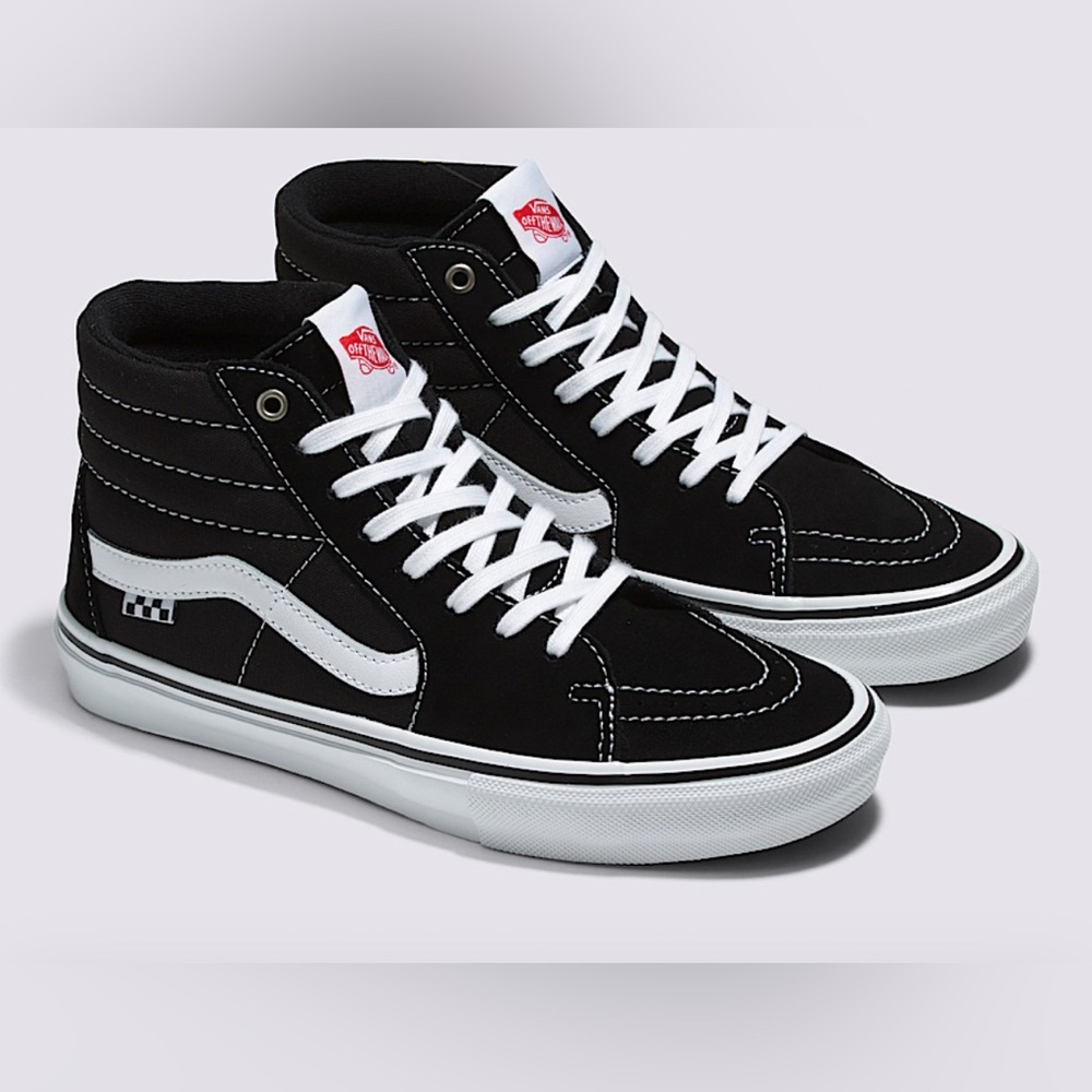 Vans Women’s Black and White High-Top Sneakers